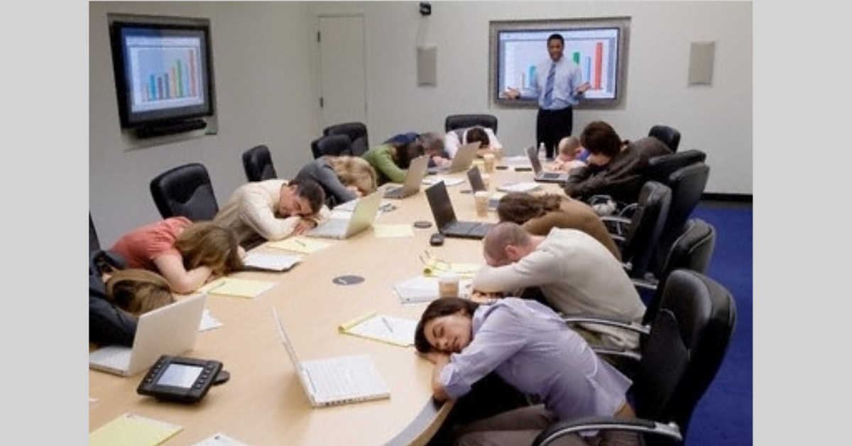 workers asleep during office meeting